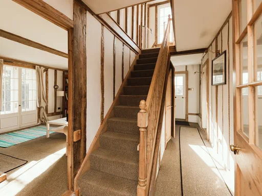 The Farmhouse Outside and Living spaces